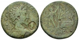 Corinthia, Corinth Marcus Aurelius, 161-180 Bronze circa 161-180, Æ 26.5mm., 12.08g. Laureate and cuirassed bust r., in front countermark. Rev. Nude A...