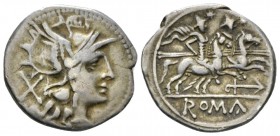 Denarius circa 209-208, AR 19.5mm., 3.89g. Helmeted head of Roma r.; behind, X. Rev. The Dioscuri galloping r.; below, anchor. In exergue, ROMA in par...
