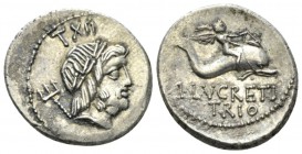 L. Lucretius Trio. Denarius 76, AR 19.5mm., 3.86g. Laureate head of Neptune r., trident over far shoulder; behind head, XXXII. Rev. Winged boy on dolp...
