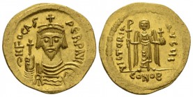 Phocas, 602 – 610 Solidus 607-610, AV 21.5mm., 4.32g. Draped and cuirassed bust facing, wearing crown surmounted by cross and holding globus cruciger....