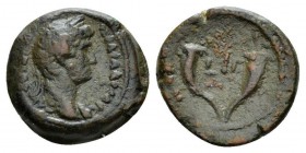 Egypt, Alexandria Hadrian, 117-138 Obol circa 127-128 (year 12), Æ 19mm., 4.68g. Laureate bust r., drapery on l. shoulder. Rev. Double cornucopia, bet...