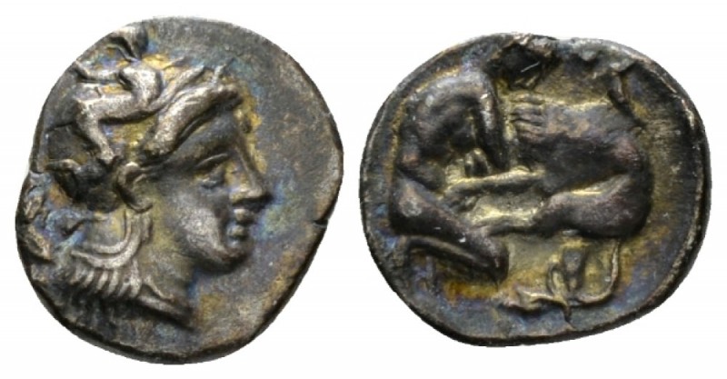 Calabria, Tarentum Diobol 325-280, AR 12.5mm., 1.09g. Head of Athena r., wearing...