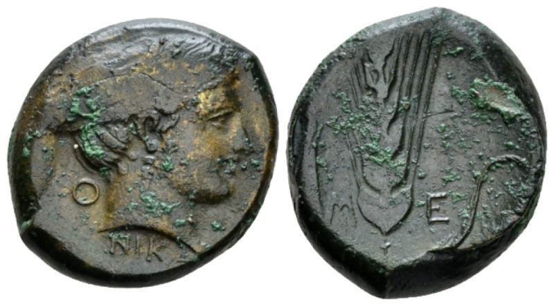 Lucania, Metapontum Nomos circa 425-350, Æ 19mm., 8.68g. Head of Nike r.; below,...
