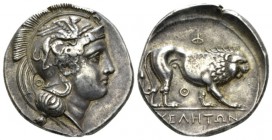 Lucania, Velia Didrachm circa 340-334, AR 21.5mm., 7.63g. Head of Athena r., wearing a crested Attic helmet decorated with a griffin; behind neck, Θ. ...