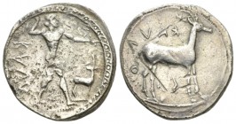 Bruttium, Caulonia Nomos circa 475-425, AR 21.5mm., 7.88g. Apollo standing r., holding branch in r. hand, small daimon running r. on extended l. arm; ...