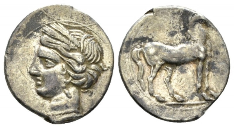 Bruttium, Locri Quarter of shekel circa 215-205, AR 15mm., 1.96g. Head of Tanit-...