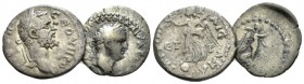 Cappadocia, Caesarea Titus, 79-81 and S. Severus, 193-211 Lot of two coins circa 79-81, AR 25.5mm., 4.48g. Laureate head r. Rev. Victory advancing r.,...