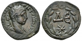 Syria, Antioch Elagabalus, 218-222 Bronze circa 218-222, Æ 22mm., 5.63g. Laureate bust r., with slight drapery. Rev. Large ΔЄ; star below; all within ...