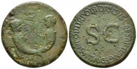 In the name of Drusus, son of Tiberius Sestertius circa 22-23, Æ 34mm., 19.51g. Confronted heads of two little boys emerging from crossed cornucopiae ...