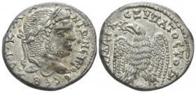 Caracalla, 198-217 Tetradrachm circa 215-217, AR 27mm., 13.81g. Laureate head r. Rev. Eagle standing facing with spread wing; head l. and holding wrea...