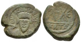 Phocas, 602-610. Half Follis – 20 Nummi Carthage circa 606/607, Æ 23mm., 10.37g. Crowned bust facing, wearing consular robes and holding mappa and cru...
