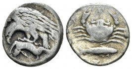 Sicily, Agrigentum Hemidrachm circa 410-406, AR 13.5mm., 1.51g. AK – PA Eagle flying l., holding hare in its talons. Rev. Crab seen from above; below,...
