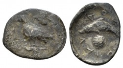 Sicily, Motya Litra circa 380-360, AR 13mm., 0.71g. Eagle standing l. on capital; above, ivy-leaf. Rev. Dolphin l. Jenkins, pl. 23, 1. SNG ANS 502.
 ...