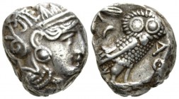 Attica, Athens Tetradrachm late IV early III cent., AR 19.5mm., 17.10g. Head of Athena r., wearing crested Attic helmet. Rev. Owl, with closed wings, ...