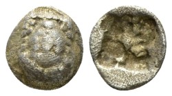 Ionia, Colophon Hemiobol circa 500-450, AR 6.5mm., 0.41g. Head of Apollo facing slightly r. Rev. Quadripartite incuse square. Cf. Milne, Colophon 12. ...