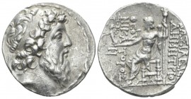 The Seleucid Kings, Antioch on the Orontes Tetradrachm circa 129-125, AR 28mm., 16.68g. Diademed head r. Rev. Zeus Nikephoros seated left; Ξ to outer ...