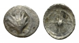 Calabria, Tarentum Hexante or Sixth of litra circa 480-470, AR 5.5mm., 0.08g. Shell. Rev. Wheel with four spokes. Vlasto 1118. Historia Numorum Italy ...