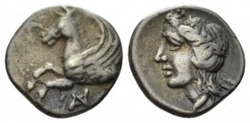 Acarnania, Anactorium Hemidrachm circa 330-300, AR 11mm., 1.31g. Forepart of Pegasos flying l. Rev. Laureate head of Apollo l. BCD Akarnania 100. SNG ...