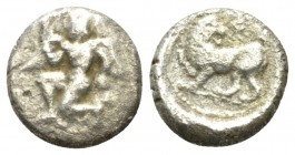 Caria, Kaunos Hemidrachm circa 460-440, AR 11mm., 1.31g. Naked male deity, with wings at shoulders and heels running l. Rev. Lion within incuse square...