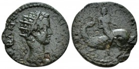Corinthia, Corinth Caracalla, 198-217 Bronze circa 198-217, Æ 22mm., 5.94g. Radiate bust r. Rev. Melikertes riding dolphin r., holding reins with both...