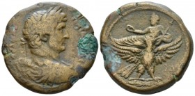 Egypt, Alexandria Hadrian, 117-138 Drachm circa 129-130 (year 14), Æ 34.5mm., 26.66g. Laureate, draped and cuirassed bust r. Rev. Zeus reclining on ea...