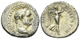 Vespasian, 69-79 Didrachm Caesarea (Cappadocia). circa 77-78, AR 21mm., 6.49g. Laureate head r. Rev. Nike walking r., holding wreath and palm. RPC 164...