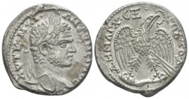 Caracalla, 198-217 Tetradrachm circa 214-215, AR 26.5mm., 13.09g. Laureate head r. Eagle standing facing on leg and thigh of animal, head and tail lef...