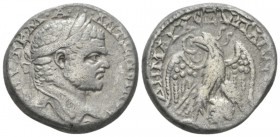 Caracalla, 198-217 Tetradrachm Emesa circa 215-217, AR 20.5mm., 14.02g. Laureate head r. Rev. Eagle standing facing, head l., with wreath in beak and ...