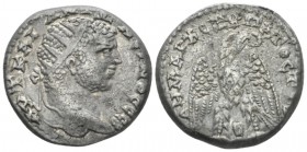 Caracalla, 198-217 Tetradrachm Rhesaena circa 215-217, AR 25mm., 13.32g. Radiate head r. Rev. Eagle standing facing, head and tail r., with wings spre...