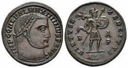 Maximinus II, 309-313 Follis Alexandria circa 308-310, Æ 23.5mm., 7.06g. Laureate head r. Rev. Virtus advancing r., in military dress, holding transve...