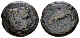 Bruttium, Croton Bronze circa 333-331, Æ 17mm., 6.10g. Head of Herakles r., wearing lion-skin headdress. Rev. KPO Eagle flying r., holding snake with ...