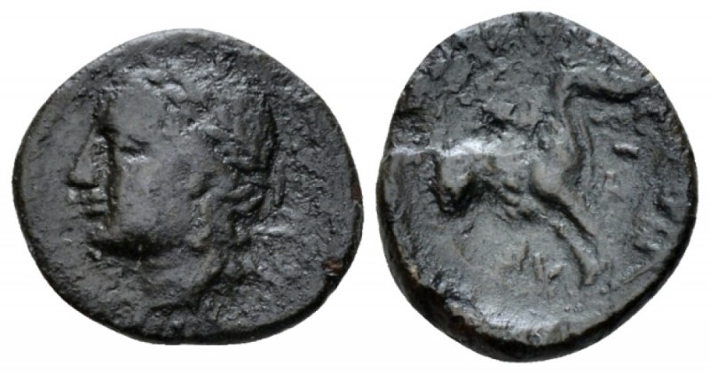 Sicily, Leontini Bronze circa 210-200, Æ 15mm., 1.54g. Laureate head of Apollo l...