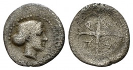 Sicily, Syracuse Hemilitra circa 440-430, AR 12.5mm., 0.32g. Head of Arethusa r., hair caught up in sakkos. Rev. Σ – V – P – A retrograde within four-...