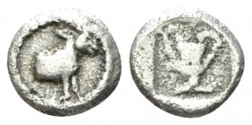 Macedonia, Mende Hemiobol (?) circa 460-423, AR 8.50.39mm., 0.39g. Forepart of mule r. Rev. Kantharos. AMNG III/2, 18. SNG ANS 365.

Very Fine/About...