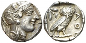 Attica, Athens Tetradrachm after 449, AR 25.5mm., 17.10g. Head of Athena r., wearing crested Attic helmet decorated with three olive leaves and a spir...