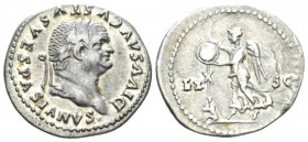 Divus Vespasianus. Denarius circa 80-81, AR 21.5mm., 3.29g. Laureate head r. Rev. Victory alighting l. placing shield on trophy; below, Judaea seated ...