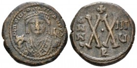 Tiberius II Constantine, 578 – 582 Half follis Antiochia 581-528 (year 8), Æ 22mm., 6.52g. δ m Tib CO – TAN PP A Cuirassed bust facing, wearing consul...