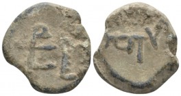 Umayyad lead seal. Umayyad lead seal. VIII-IX cent., PB 20mm., 15.17g. Umayyad lead seal.

Very Fine.