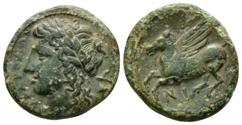 Sicily, Syracuse Bronze circa 336-317, Æ 19mm., 4.57g. Laureate head of Apollo l...