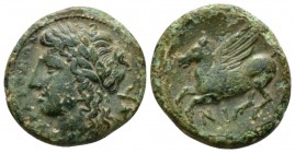 Sicily, Syracuse Bronze circa 336-317, Æ 19mm., 4.57g. Laureate head of Apollo l. Rev. Pegasus flying l. Calciati 85.

Attractive light green patina...