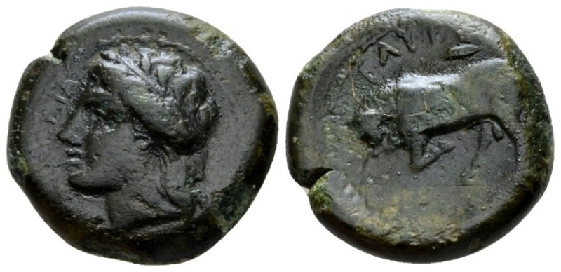Sicily, Tauromenium Bronze after 357, Æ 21mm., 7.54g. Laureate head of Apollo l....