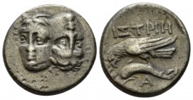 Moesia, Istrus Drachm circa 312-280, AR 19mm., 4.20g. Two heads: one upright, one inverted. Rev. Sea-eagle flying l., holding, fish. SNG BM Blacksea 2...