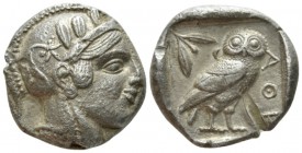 Attica, Athens Tetradrachm circa 440-420, Æ 24.5mm., 16.95g. Head of Athena r., wearing Attic helmet decorated with olive wreath and palmettae. Rev. O...