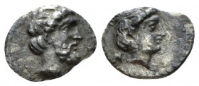 Cilicia, Nagidos Obol circa 400-380, AR 11mm., 0.53g. Head of Aphrodite r. Rev. Bearded head of Dionysos r., wearing ivy wreath. SNG Levante 3. SNG Fr...