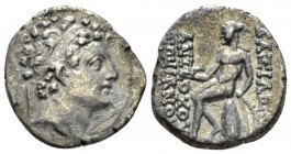 The Seleucid Kings, Antiochus IV, 146-145. Antioch Drachm circa 146-145, AR 18mm., 3.67g. Diademed head r. Rev. Apollo seated on omphalos l., holding ...