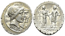 Q. Fufius Calenus and Mucius Cordus. Denarius serratus 70, AR 20mm., 3.92g. Jugate heads of Honos and Virtus r.; in l. field, HO and in r. field, VIRT...