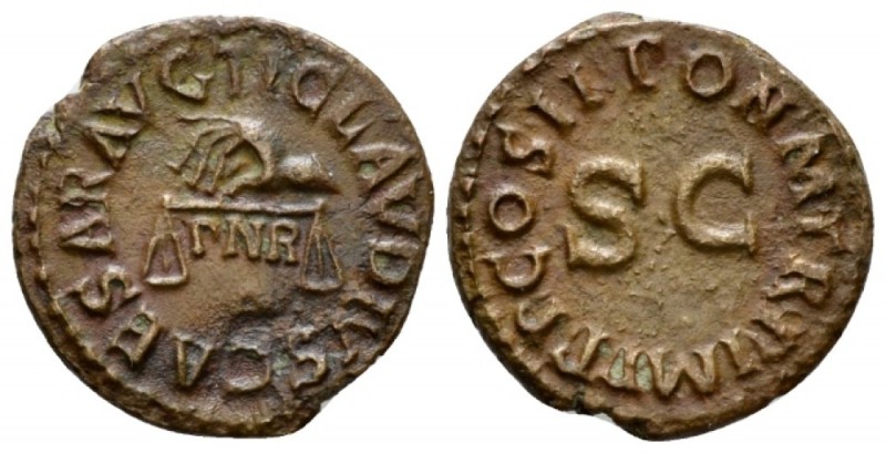 Claudius, 41-54 Quadrans January 42, Æ 17mm., 2.92g. Hand l. holding scales, bet...