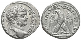 Caracalla, 198-217 Tetradrachm Tyre (Phoenicia) 28-212, AR 26mm., 12.96g. Laureate head r. Rev. Eagle standing facing, head l., with wings spread, hol...