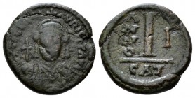 Maurice Tiberius, 582-602 Decanummo Catania 582-583 (year 1), Æ 17mm., 2.44g. Crowned and cuirassed facing bust, holding globus cruciger and shield. R...