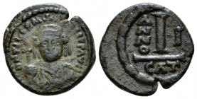 Maurice Tiberius, 582-602. Decanummo Catania 528-583 (year 1), Æ 17.5mm., 3.03g. Crowned and cuirassed facing bust, holding globus cruciger and shield...